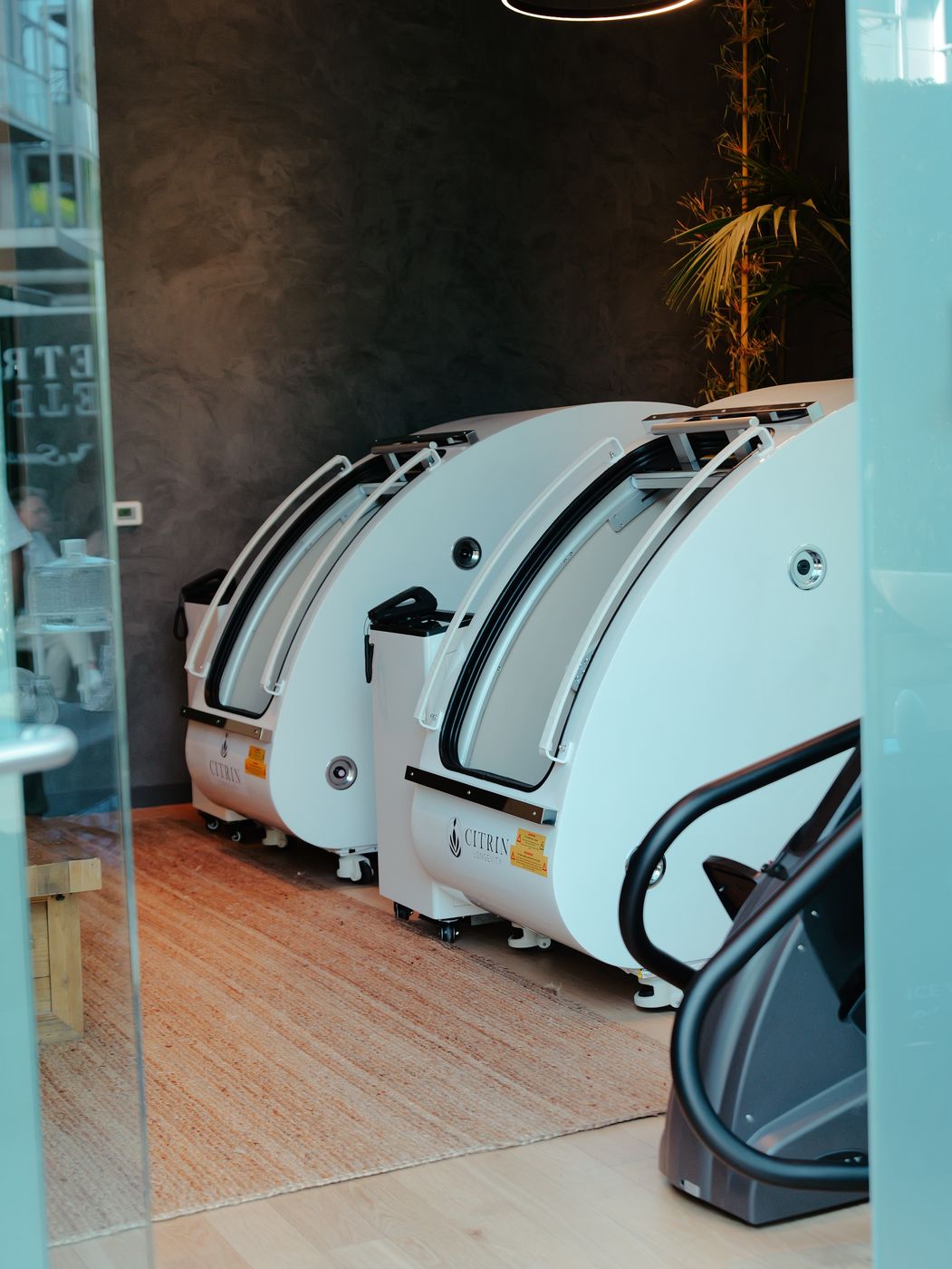 Hyperbaric oxygen therapy pods and a VASPER machine inside the Citrin Longevity clinic in West Hollywood