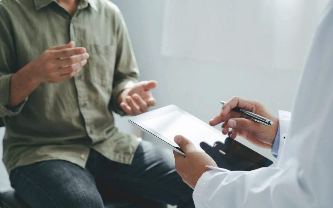 A doctor reviewing testosterone results with a male patient at Citrin Longevity in West Hollywood